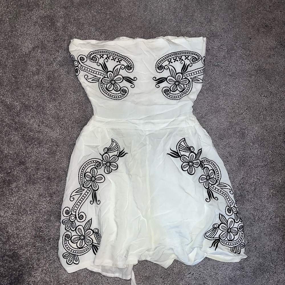 White strapless romper with black embroidered flowers